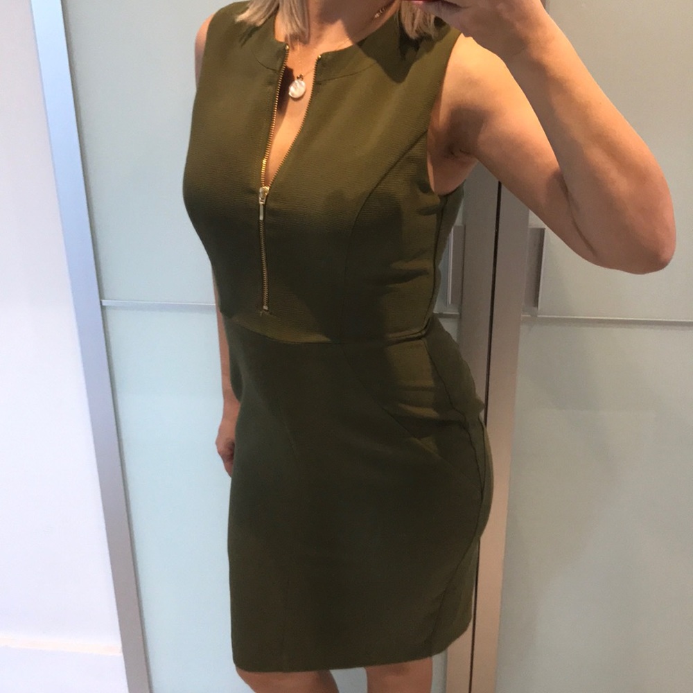 Green dress with gold zipper detail in front